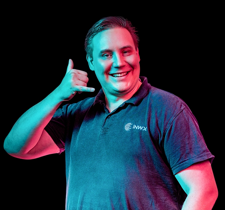 Man shapes telephone with his hand